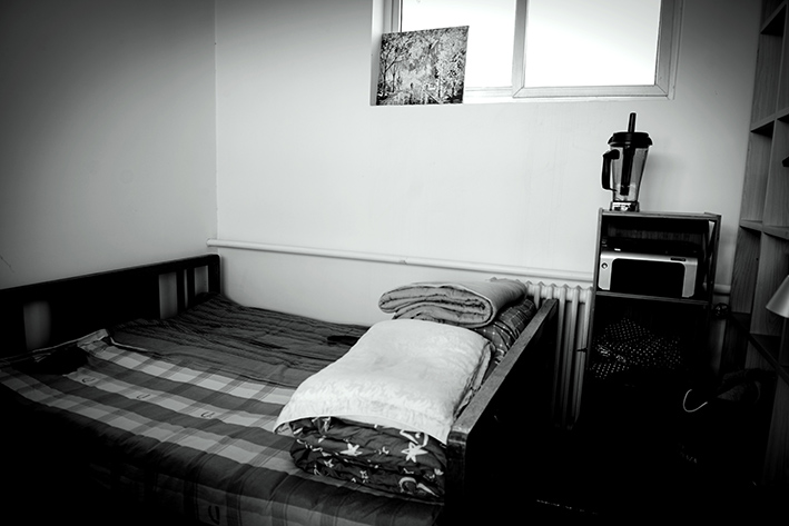 Yao's scantily furnished bedroom at his home in Changping.