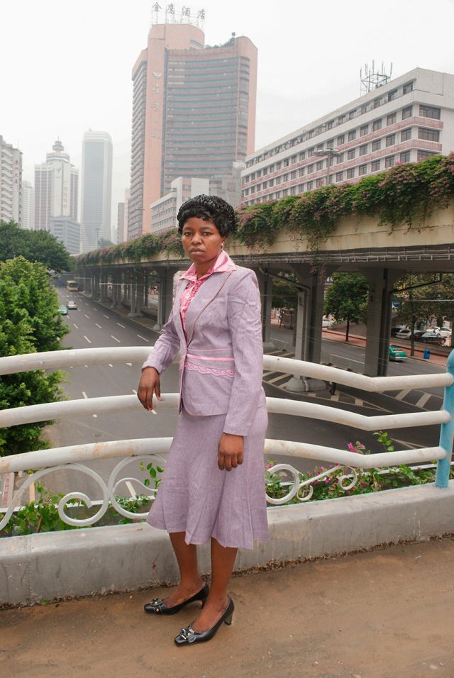 portrait-of-a-woman-on-a-bridge-in-guangzhou.jpg