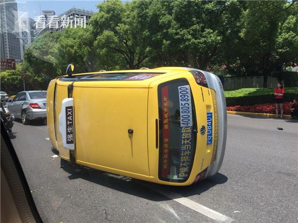 Taxi overturned Century Avenue