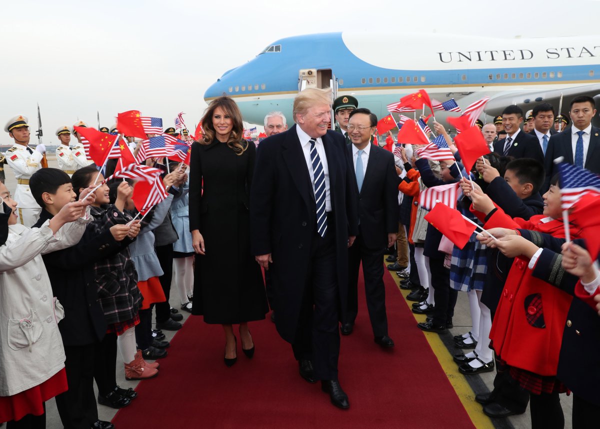 Trumps land in Beijing from Air Force One