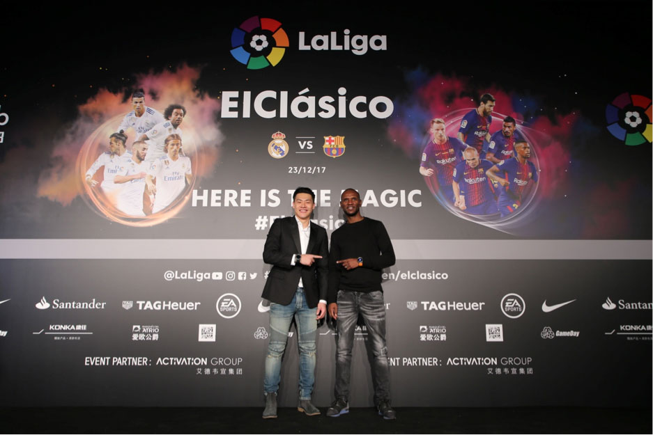 Wang Dalei (left) and Abidal (right) 