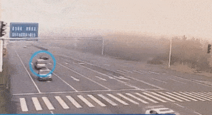 WATCH: Truck Makes 180 Degree Spin to Miraculously Avoid Crash in China