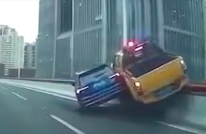 WATCH: Truck Almost Rammed Off Elevated Highway in Shanghai