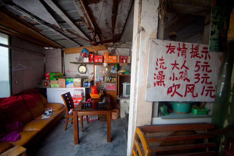 Shower rooms in Guijin Cun migrant village in Shanghai