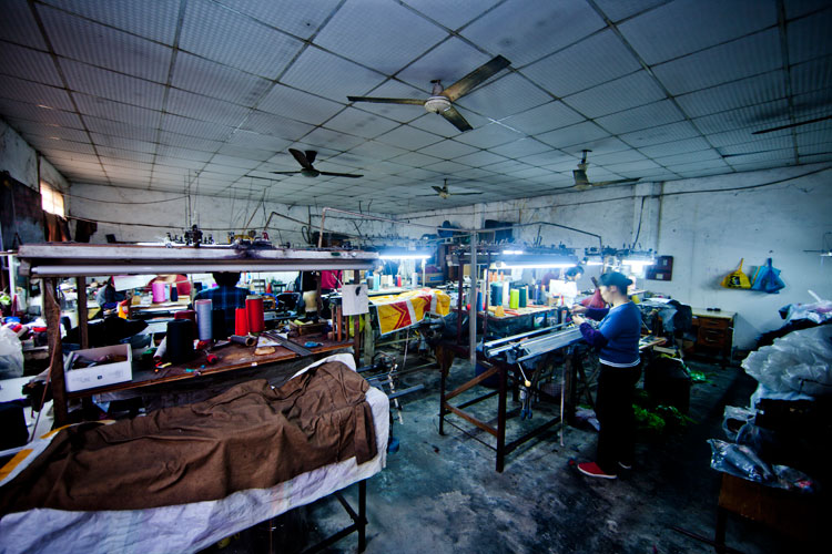 A sweater factory in Shanghai's inner city village of migrant workers Guijin Cun