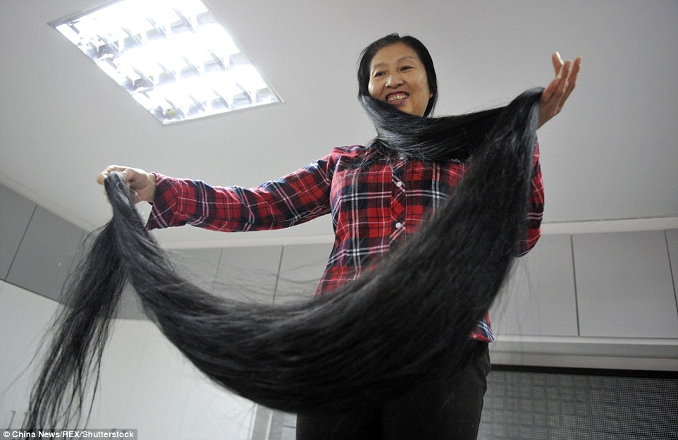 Woman with 11-foot-long hair