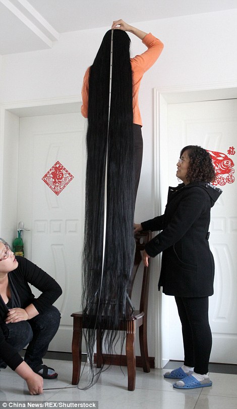 Woman with 11-foot-long hair
