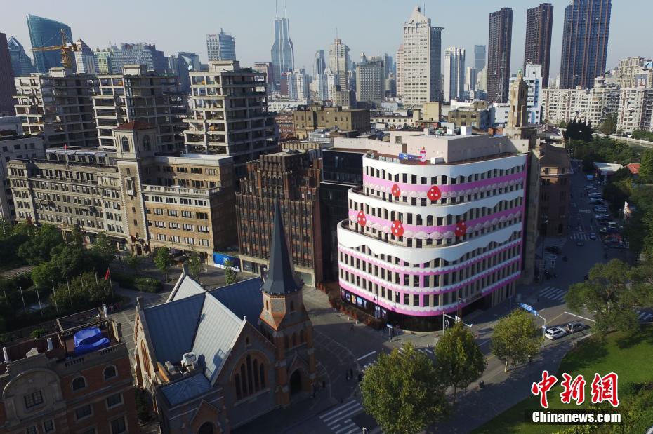 PHOTOS: Shanghai Building Transforms in Strawberry Cake