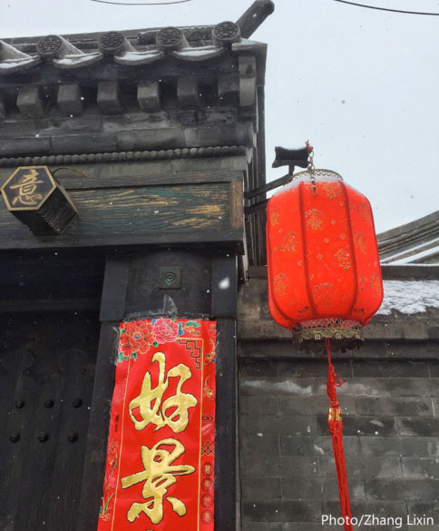 PHOTOS: Beijing Sees First Snow of the Season