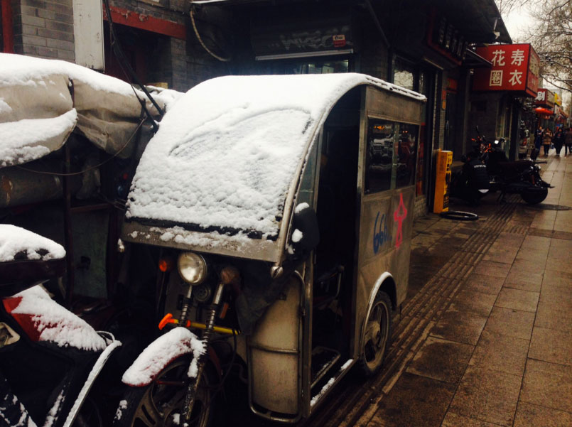 PHOTOS: Beijing Sees First Snow of the Season