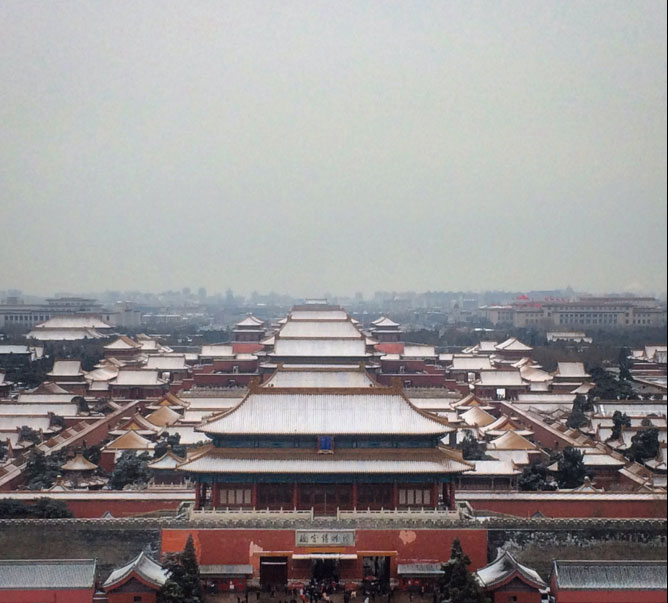 PHOTOS: Beijing Sees First Snow of the Season