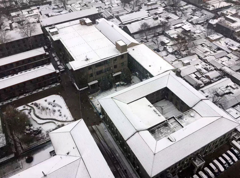 PHOTOS: Beijing Sees First Snow of the Season