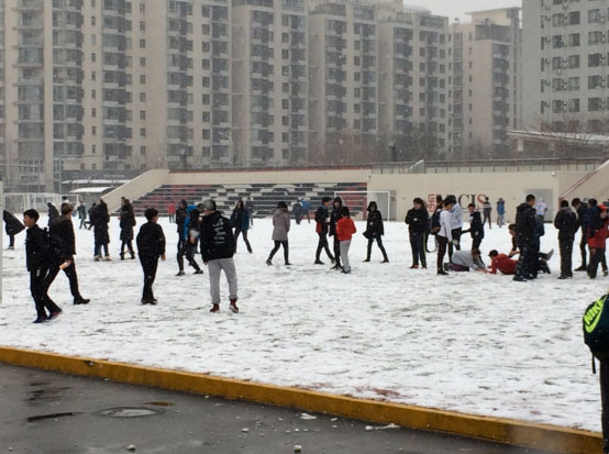 PHOTOS: Beijing Sees First Snow of the Season