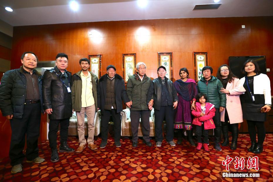 Chinese Man trapped india reunited with family
