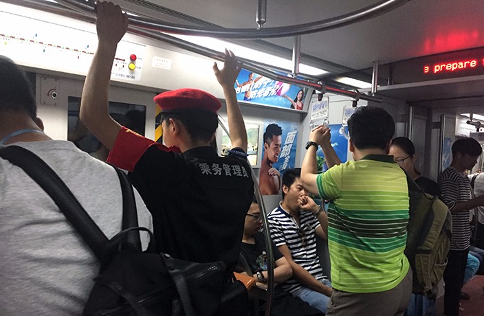 Beijing Subway Cars Are Now Occupied by Security Guards in Red Berets