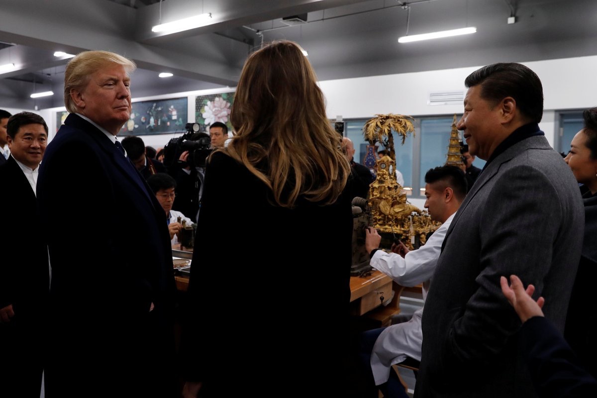 PHOTOS: Trump Visits Forbidden City, Tries to Pick Up Gold Vase