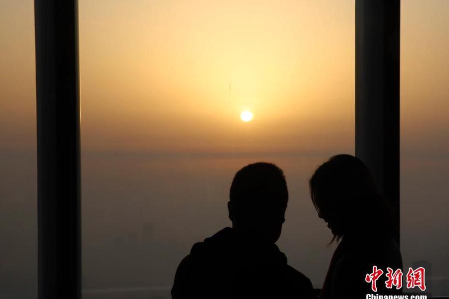 Sunrise in Shanghai smog new year