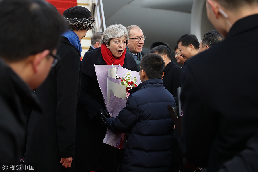 PHOTOS: UK Prime Minister Theresa May Arrives in China