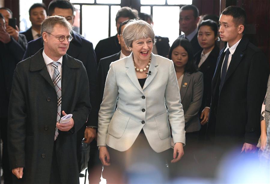 PHOTOS: UK Prime Minister Theresa May Arrives in China