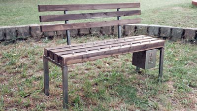 Coin-operated-pay-bench-sits-in-Shandong-park-in-2010.jpg