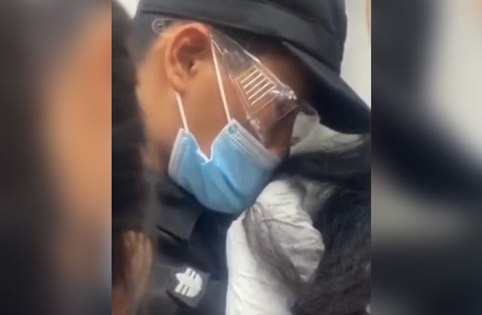 WATCH: Metro Security Guard Caught Sniffing Woman's Hair in China