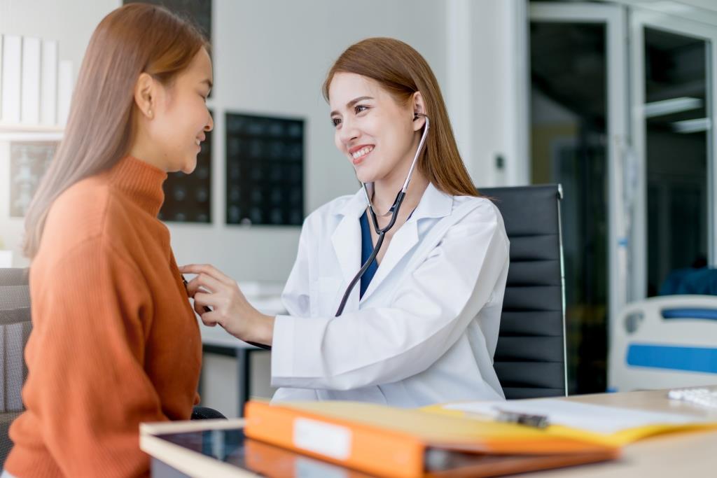 asian-woman-doctor-breast-cancer-symptoms-risk-factors-treatment-checking-patient-clinic-office.jpg