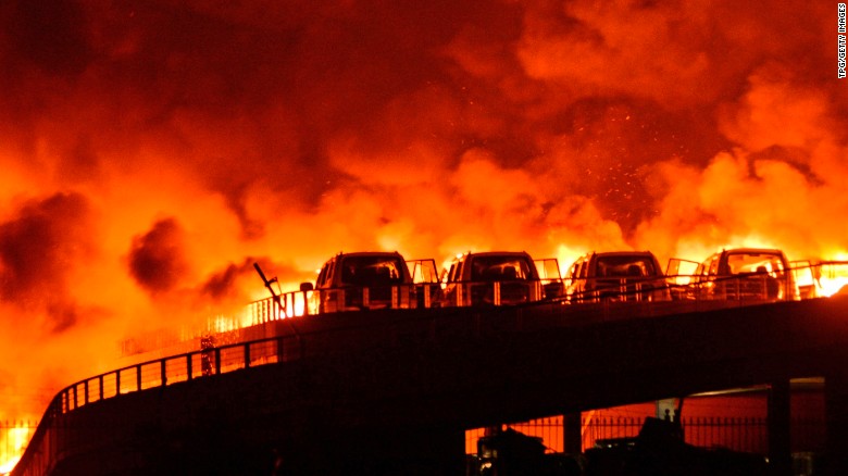 Fires blazed after massive explosions in Tianjin